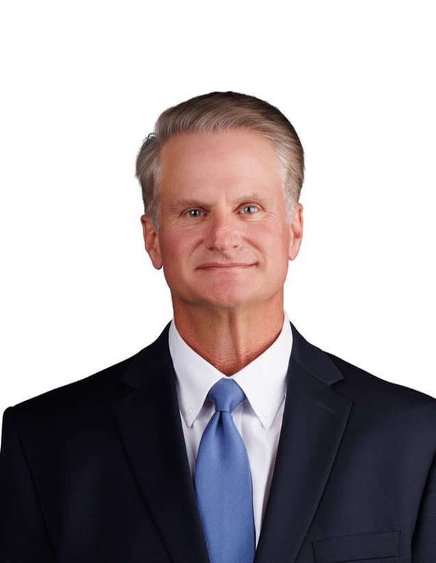 Richard Shaffer in front of a white background.