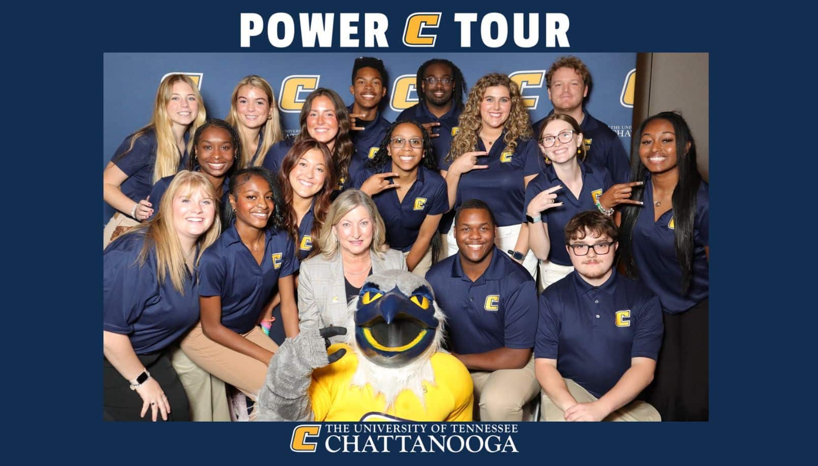 wp-power-c-tour-916x1608-1608 Group of students with the Chancellor and Scrappy, with blue border and UTC logos.